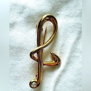 Brooch . Vintage Brooch. Gold finish Music sign with rhinestone.